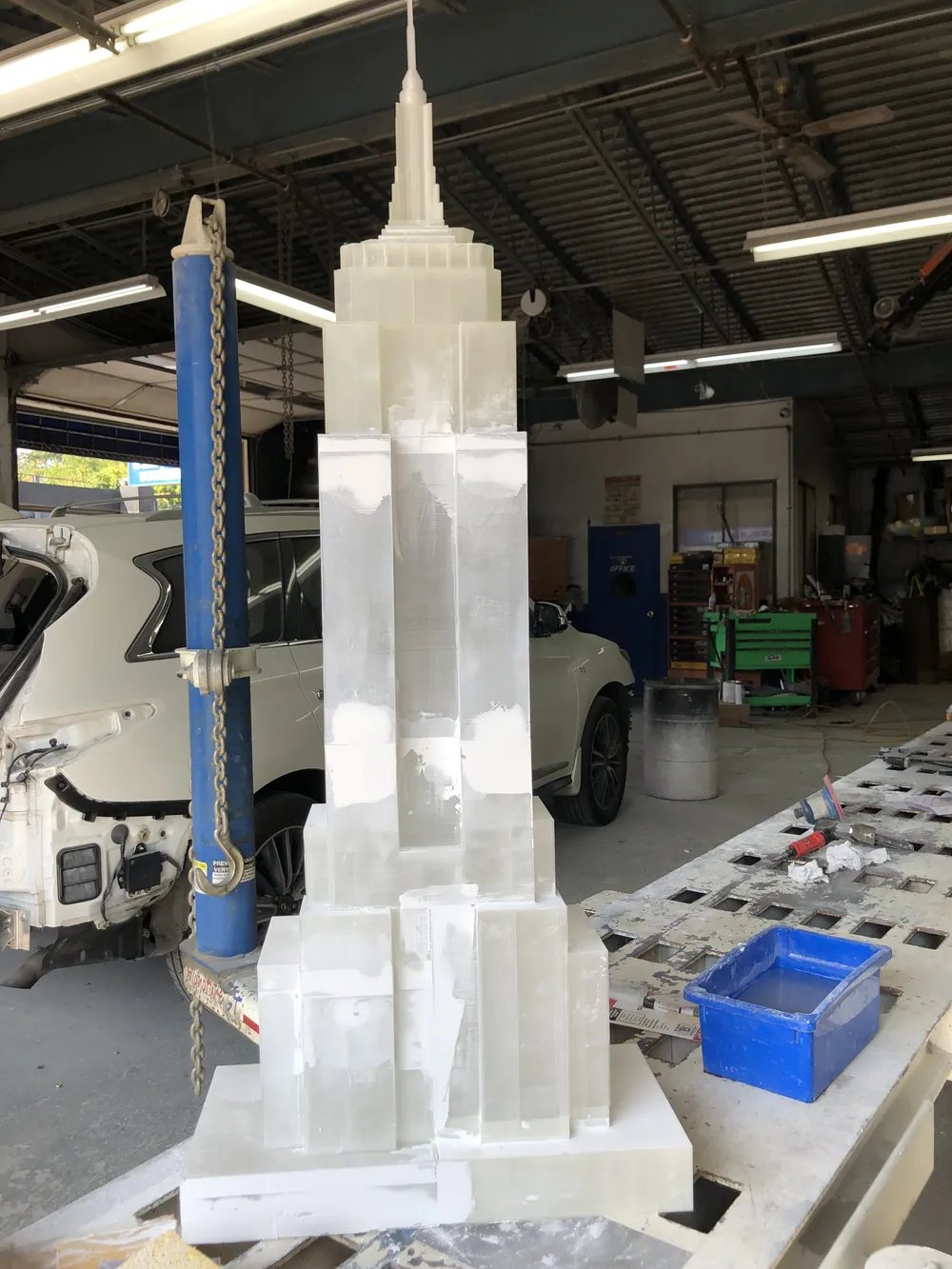 At the body shop: assembled pieces, then the automotive booth