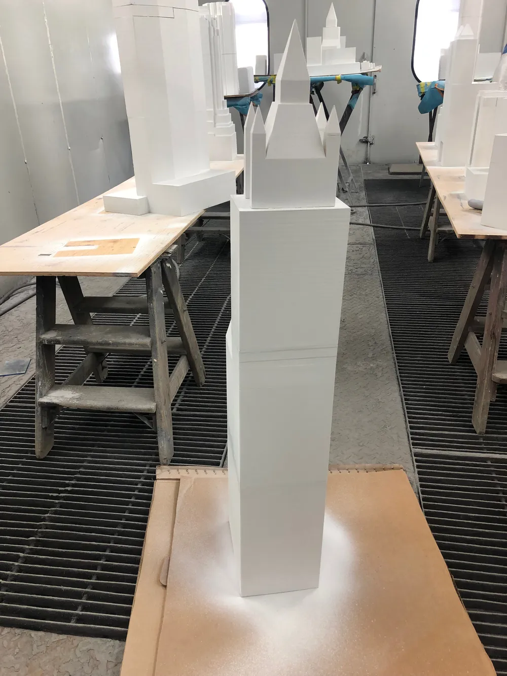 At the body shop: assembled pieces, then the automotive booth